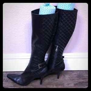 Black Guess 2 1/2 in. heeled boots.  Size 8.5